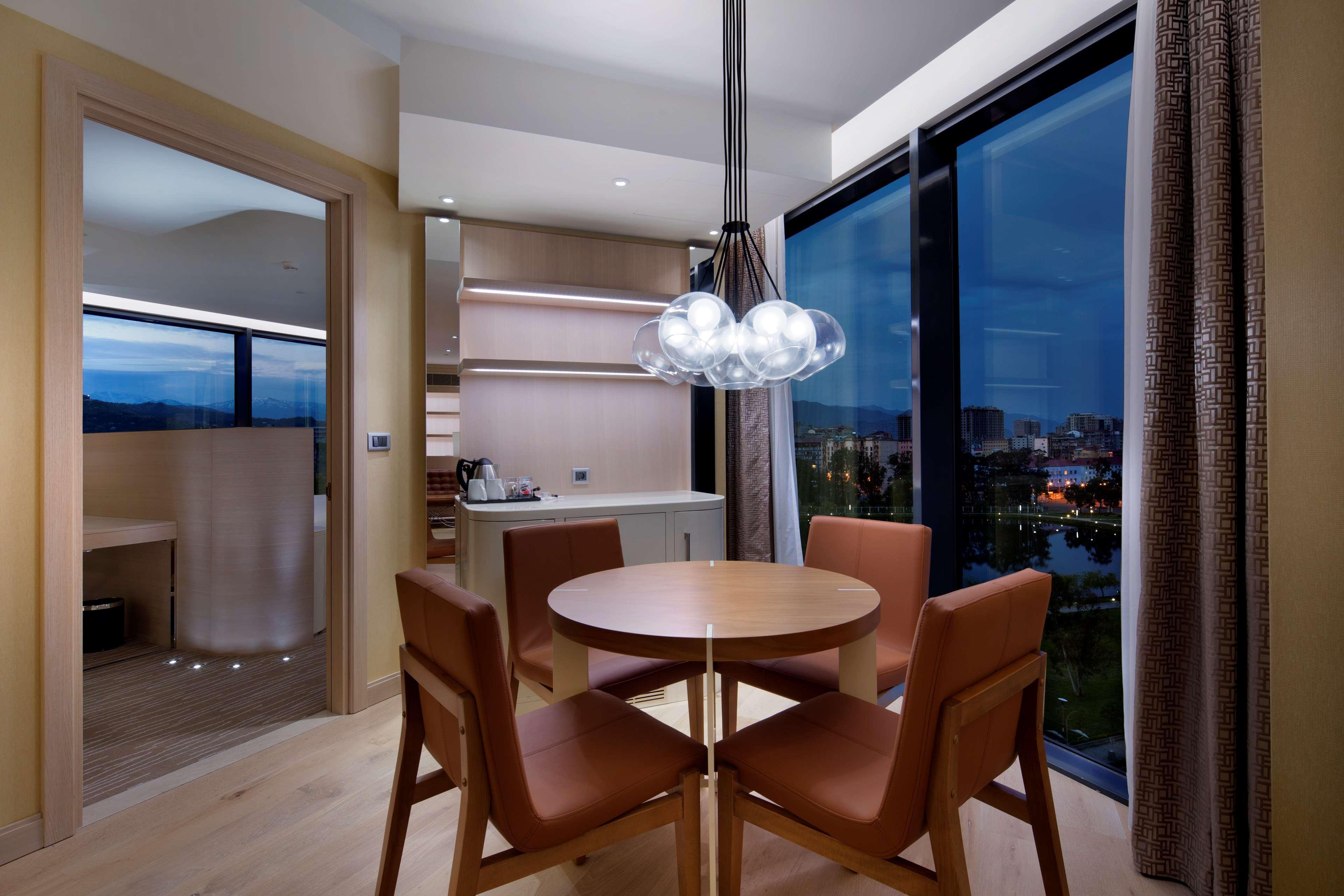 Hilton Batumi Hotel Exterior photo A dining room in a private apartment